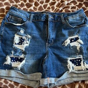 Judy Blue with navy blue stars patches in distressing size X Large like new